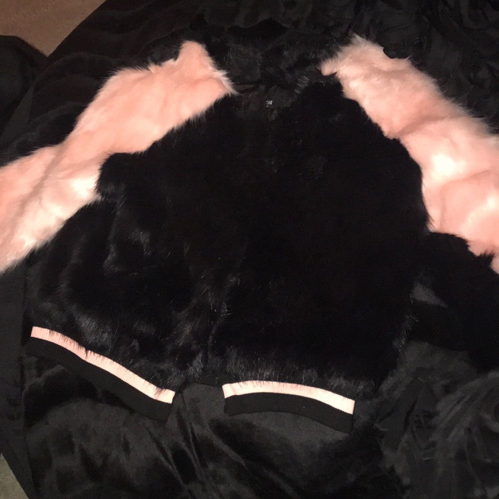 Stylish fur coat never worn